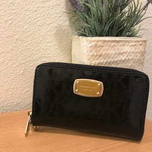 Michael Kors black wristlet style wallet